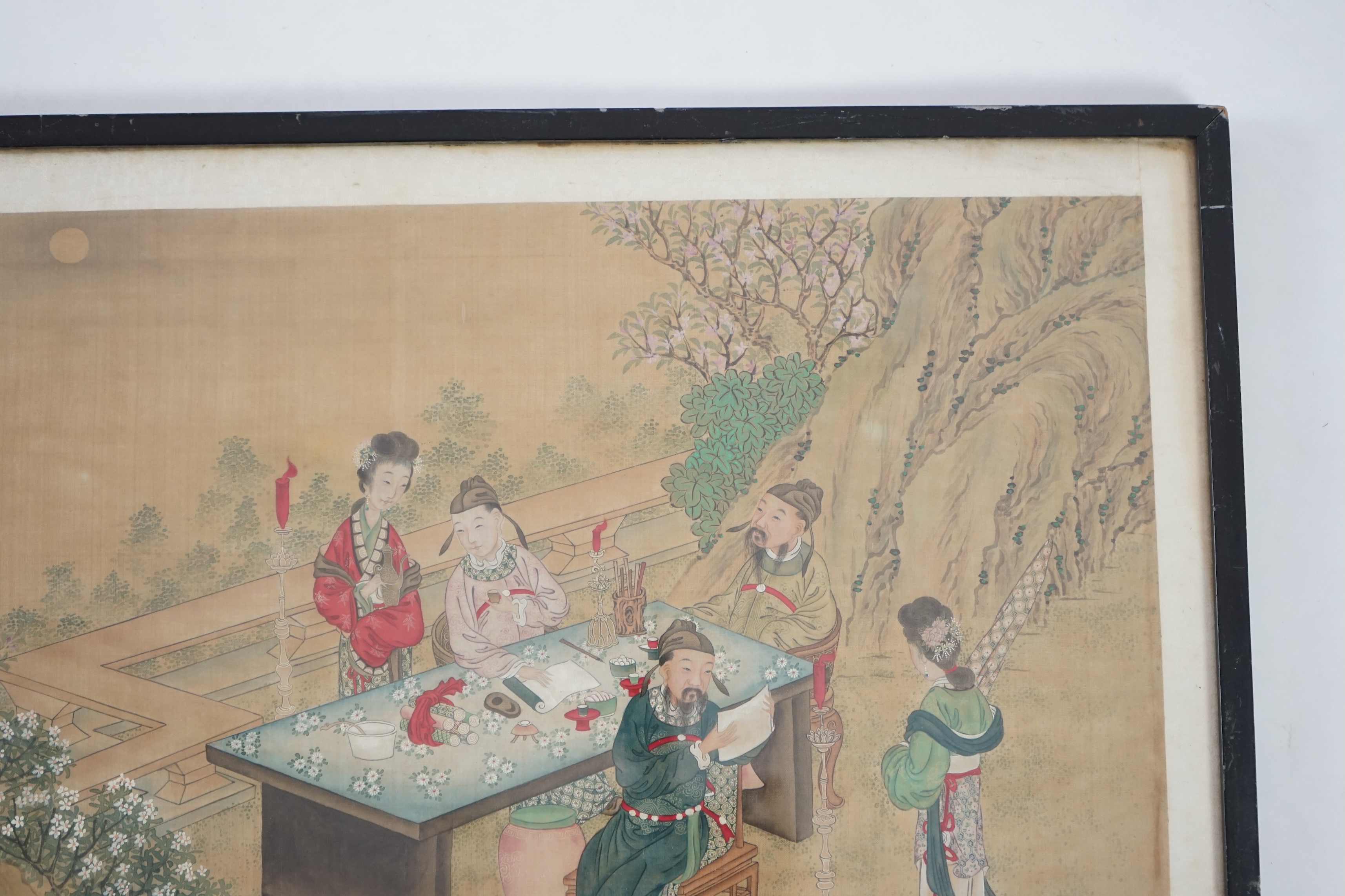 Chinese School, late 19th century, painting on silk, Scholars and attendants in a garden, 35cm x 58cm, framed and glazed. Condition - fair, some general discolouration